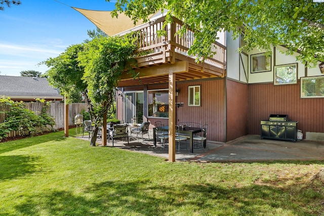 4834 W Robin Ct, West Richland, WA 99353 - back of house featuring a patio area and a wooden deck