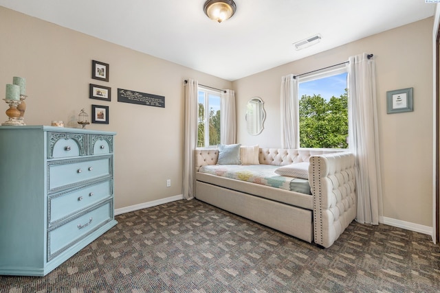 4834 W Robin Ct, West Richland, WA 99353 - bedroom with dark carpet and multiple windows