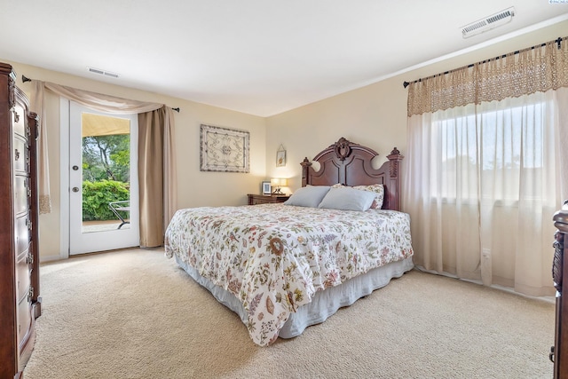 4834 W Robin Ct, West Richland, WA 99353 - bedroom featuring access to outside and light colored carpet
