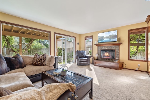 4834 W Robin Ct, West Richland, WA 99353 - living room featuring healthy amount of natural light, carpet, and a glass covered fireplace