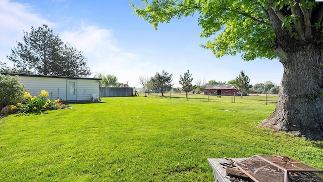 view of yard featuring fence