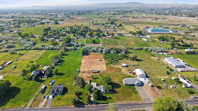 drone / aerial view featuring a mountain view