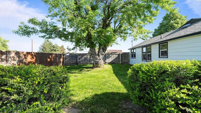 view of yard featuring a fenced backyard