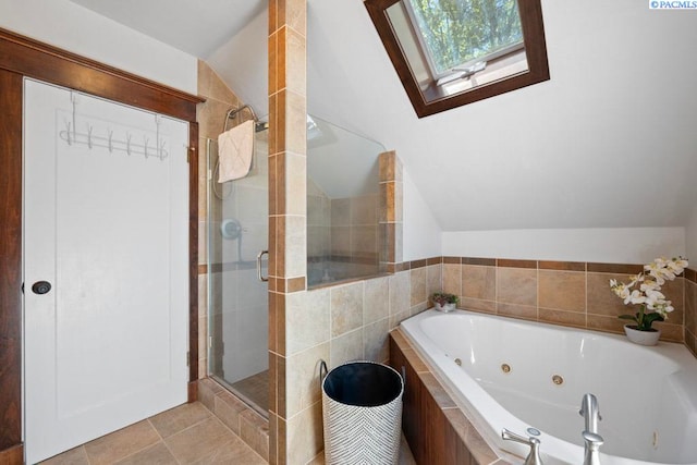 1005 NW State St, Pullman, WA 99163 - full bathroom with a shower stall, lofted ceiling, a tub with jets, a skylight, and tile patterned floors