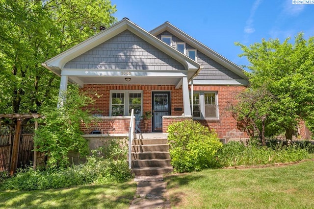 1005 NW State St, Pullman, WA 99163 - view of front of house with a porch and brick siding