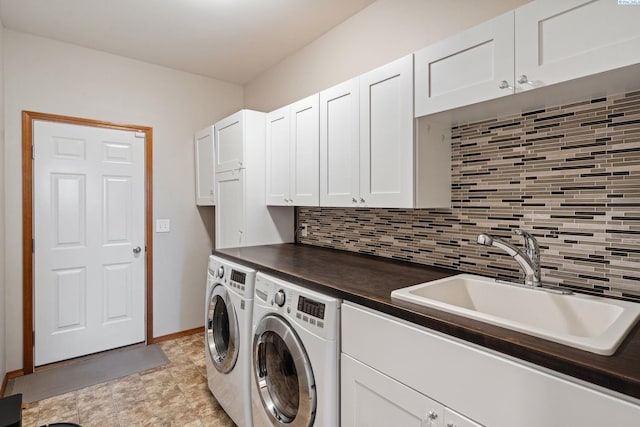 8712 W 9th Ave, Kennewick, WA 99336 - washroom featuring washer and clothes dryer and cabinet space