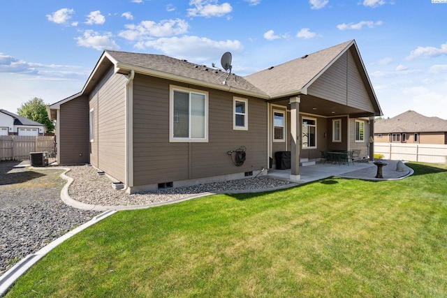 8712 W 9th Ave, Kennewick, WA 99336 - rear view of property with a patio and a fenced backyard