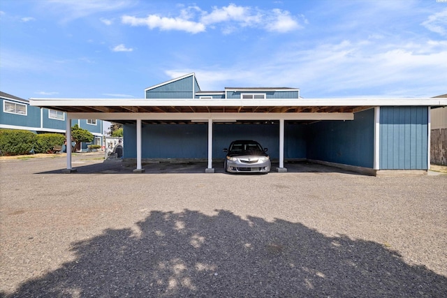 view of parking with a carport