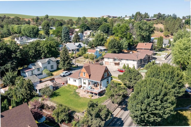 birds eye view of property with a residential view