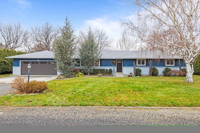 single story home with a garage and a front lawn