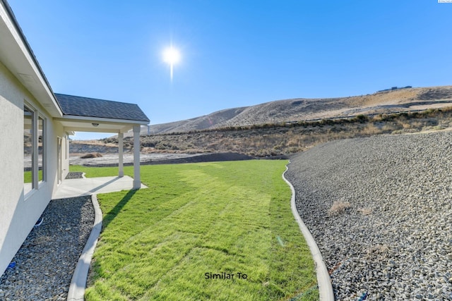 6482 W 30th Pl, Kennewick, WA 99338 - view of grassy yard featuring a patio and a mountain view