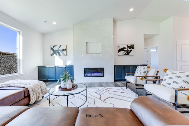 6482 W 30th Pl, Kennewick, WA 99338 - living room featuring wood finished floors, lofted ceiling, a high end fireplace, and recessed lighting