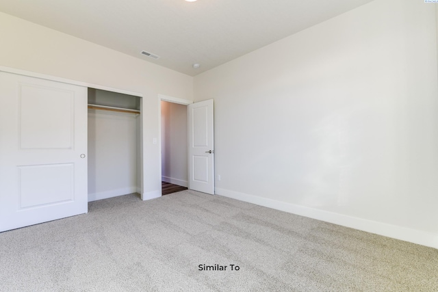 6482 W 30th Pl, Kennewick, WA 99338 - unfurnished bedroom with carpet flooring, baseboards, and a closet
