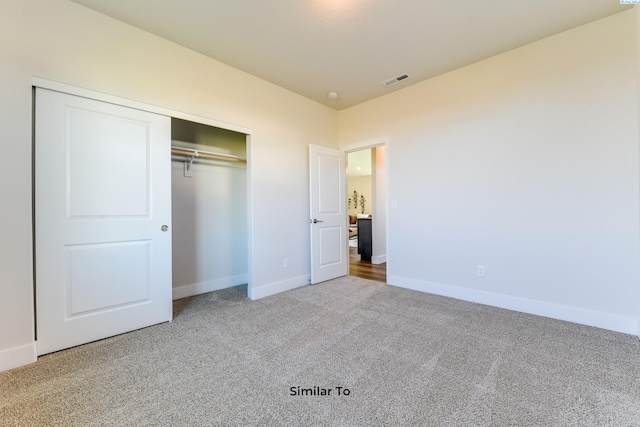 6482 W 30th Pl, Kennewick, WA 99338 - unfurnished bedroom featuring carpet flooring, a closet, and baseboards