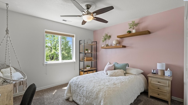 1824 W 28th Ave, Kennewick, WA 99337 - carpeted bedroom featuring baseboards and a ceiling fan