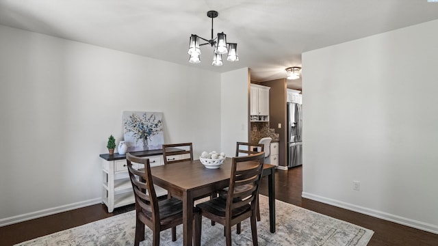 1824 W 28th Ave, Kennewick, WA 99337 - dining room with a chandelier and dark wood-style flooring