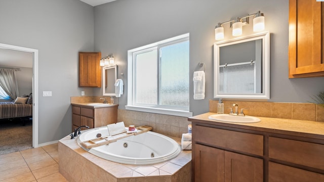 1824 W 28th Ave, Kennewick, WA 99337 - ensuite bathroom featuring a whirlpool tub, two vanities, tile patterned floors, and a high ceiling