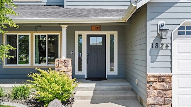 1824 W 28th Ave, Kennewick, WA 99337 - property entrance with a shingled roof and a porch