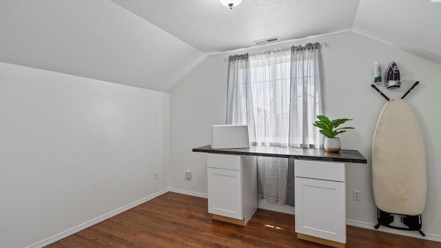 1824 W 28th Ave, Kennewick, WA 99337 - unfurnished office with vaulted ceiling and dark wood finished floors