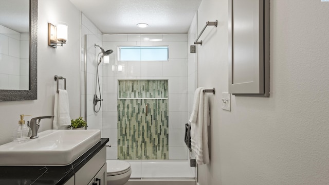 654 Cottonwood Dr, Richland, WA 99352 - bathroom featuring toilet, vanity, and tiled shower