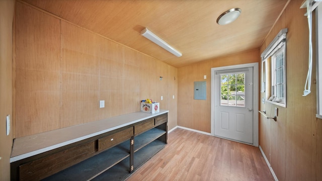 654 Cottonwood Dr, Richland, WA 99352 - entrance foyer featuring light wood finished floors, electric panel, baseboards, wooden walls, and wooden ceiling