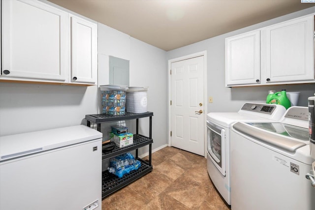 2519 W Grand Rhonde Pl, Kennewick, WA 99336 - laundry area with cabinet space and washer and clothes dryer