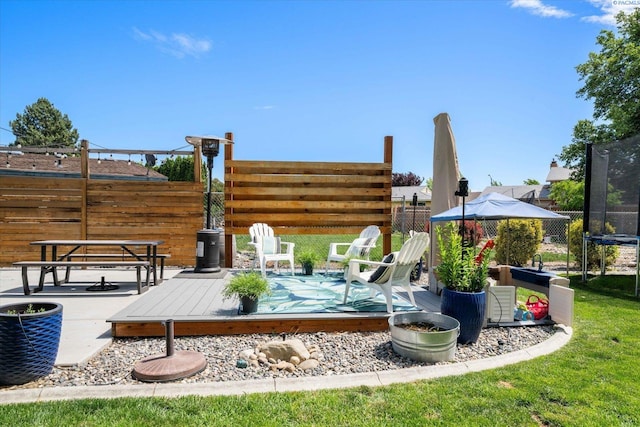 2519 W Grand Rhonde Pl, Kennewick, WA 99336 - view of patio / terrace with a trampoline and a deck