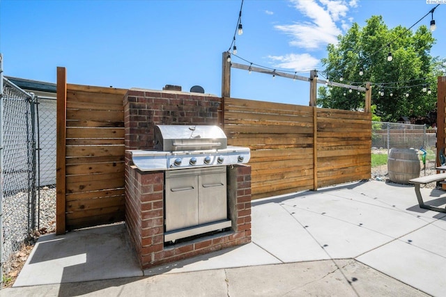 2519 W Grand Rhonde Pl, Kennewick, WA 99336 - view of patio featuring a grill