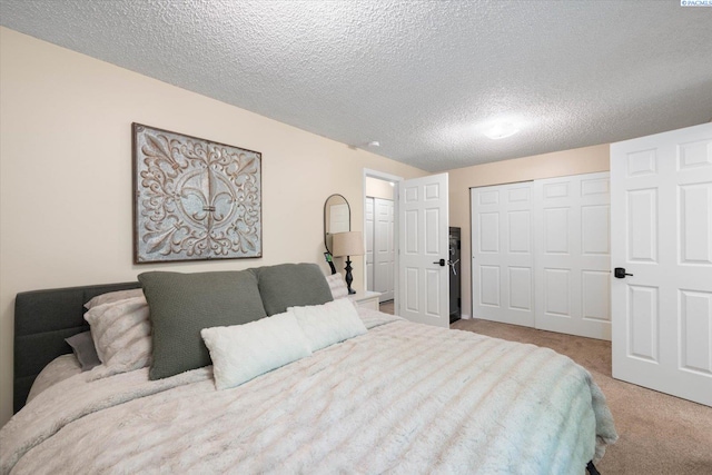 2519 W Grand Rhonde Pl, Kennewick, WA 99336 - bedroom with light colored carpet, a closet, and a textured ceiling