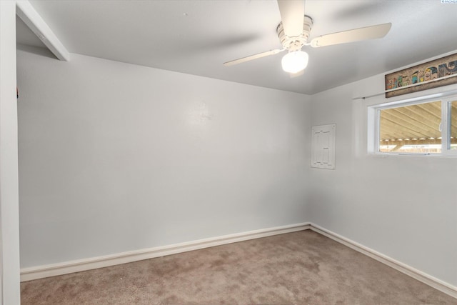 spare room featuring carpet floors and ceiling fan