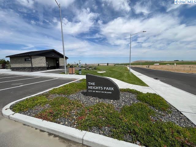 7867 Blanchard Loop, West Richland, WA 99353 - view of asphalt road with street lighting