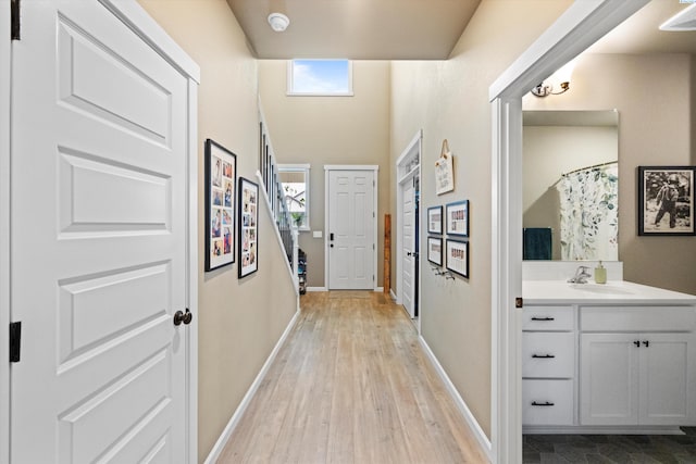 7867 Blanchard Loop, West Richland, WA 99353 - corridor with healthy amount of natural light and light wood-type flooring