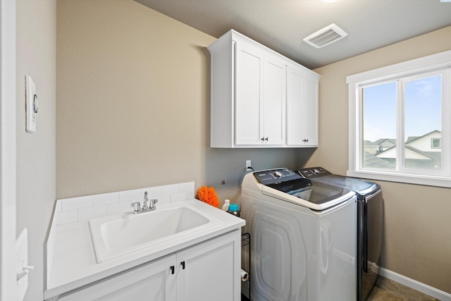 7867 Blanchard Loop, West Richland, WA 99353 - washroom with independent washer and dryer and cabinet space