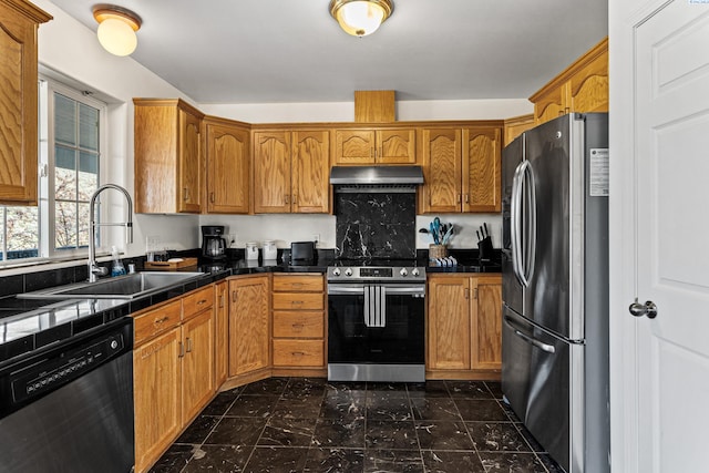 1348 Rohman Dr, Prosser, WA 99350 - kitchen featuring under cabinet range hood, a sink, stainless steel appliances, and brown cabinetry