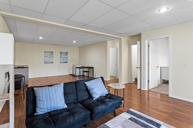 1348 Rohman Dr, Prosser, WA 99350 - living room featuring baseboards, wood finished floors, recessed lighting, and a drop ceiling