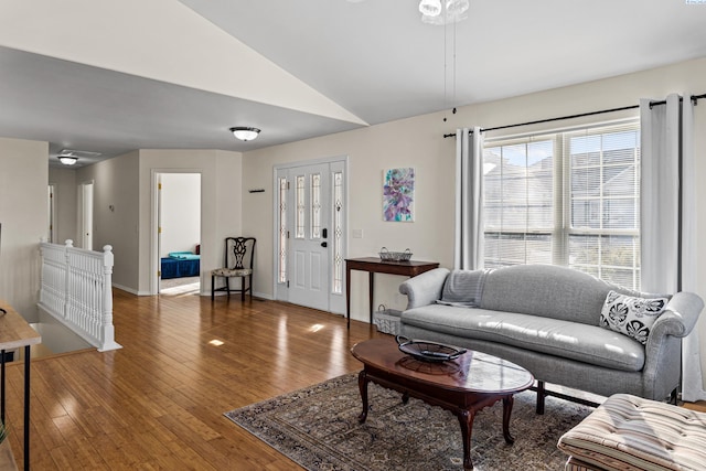 1348 Rohman Dr, Prosser, WA 99350 - living room featuring hardwood / wood-style floors, baseboards, and vaulted ceiling