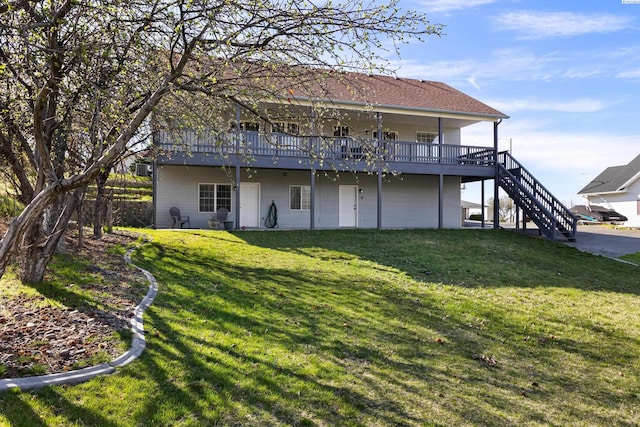 1348 Rohman Dr, Prosser, WA 99350 - back of house featuring a wooden deck, stairway, and a lawn