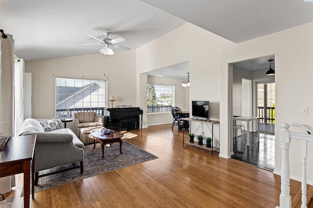 1348 Rohman Dr, Prosser, WA 99350 - living room featuring vaulted ceiling, a ceiling fan, and wood-type flooring