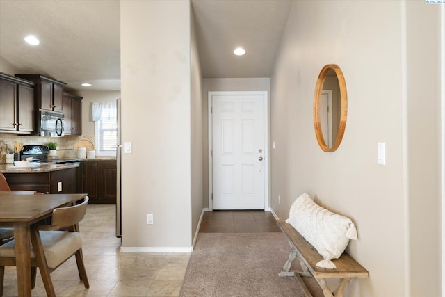 interior space featuring light tile patterned floors