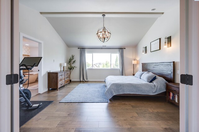 930 SW Finch Way, Pullman, WA 99163 - bedroom featuring a chandelier and wood finished floors