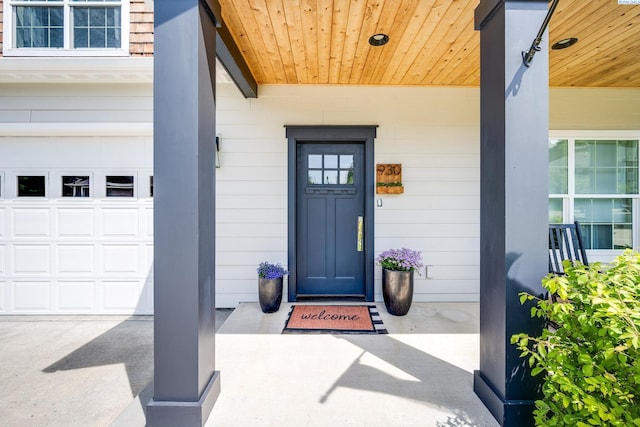 930 SW Finch Way, Pullman, WA 99163 - doorway to property featuring a porch and a garage