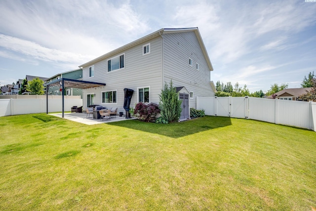 930 SW Finch Way, Pullman, WA 99163 - rear view of property featuring a gate, a patio area, a fenced backyard, and an outdoor hangout area