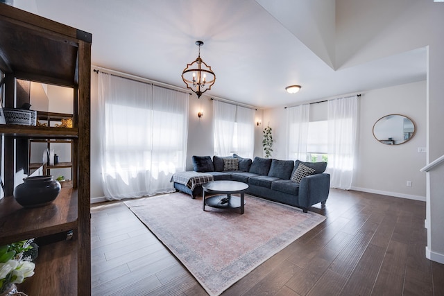930 SW Finch Way, Pullman, WA 99163 - living room featuring a chandelier and dark wood-style flooring