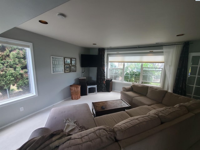 7218 W 15th Ave, Kennewick, WA 99336 - living area featuring carpet floors, plenty of natural light, and baseboards