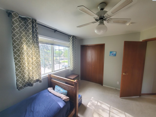 7218 W 15th Ave, Kennewick, WA 99336 - bedroom with a closet, carpet, ceiling fan, and baseboards