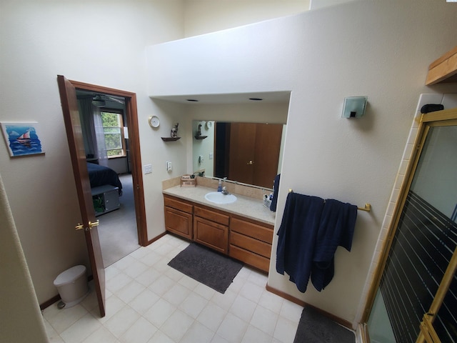 7218 W 15th Ave, Kennewick, WA 99336 - full bath with vanity, an enclosed shower, a high ceiling, and ensuite bathroom