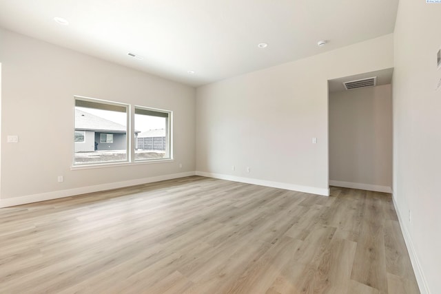 10402 Kokanee Dr, Pasco, WA 99301 - unfurnished room with visible vents, light wood-style flooring, and baseboards