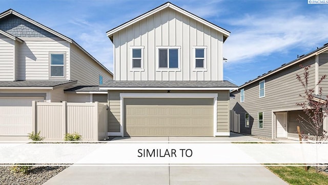 659 S Zeelar St, Kennewick, WA 99336 - view of front facade with a garage, board and batten siding, concrete driveway, and a shingled roof