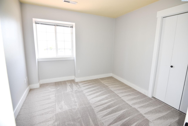 2780 Katie Rd, Kennewick, WA 99338 - unfurnished bedroom with carpet, a closet, and baseboards