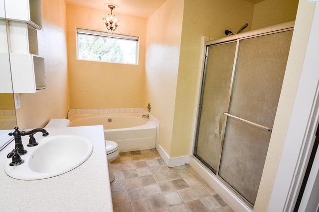 full bathroom with toilet, a garden tub, an inviting chandelier, and a stall shower
